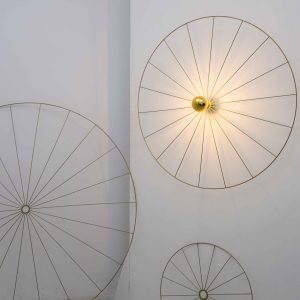Aplique minimalista en forma de rueda geométrica de luz vintage
